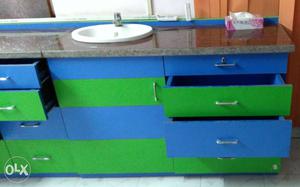 Green And Blue Wooden Drawer Cabinet With Sink