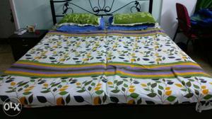 Iron bed queen size with storage in excellent condition