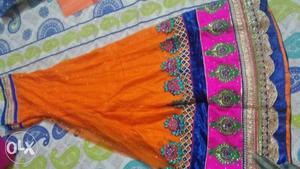 Orange and mazenta combination and blue blouse