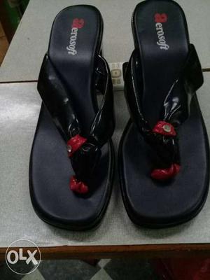 Pair Of Black Aerosoft Leather Sandals