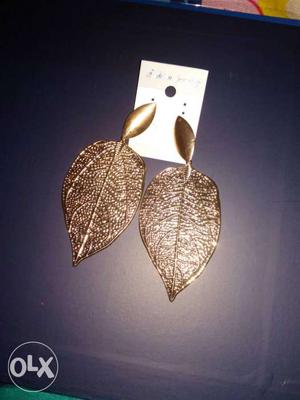 Pair Of Gold-colored Leaf Earrings