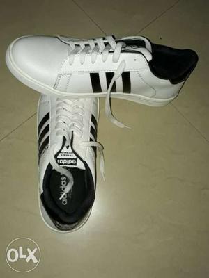 Pair Of White-and-black Adidas Leather Mid-cut Sneakers