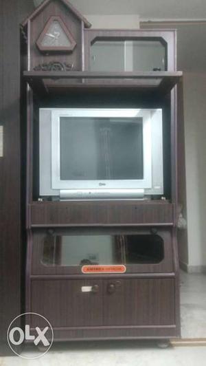 Sag wooden cabinet with tv