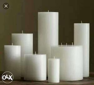 Seven White Pillar Candles