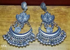 Two Silver-colored Drop Earrings