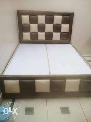 Upholstered White And Brown Bed Frame