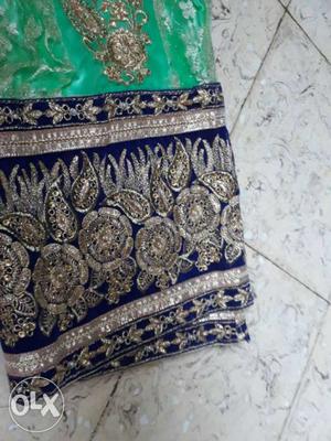 Women's Gold,blue And Green Sari