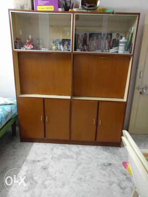 Wooden cup-board with reading table for children