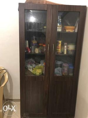 Wooden cupboard with shelves