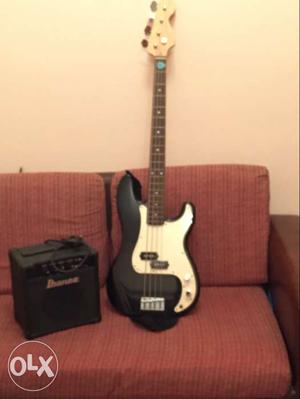 Black And White Stratocaster Electric Guitar With Amplifier