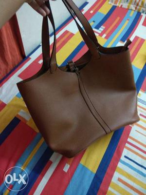 Chocolate brown tote bag with additional security