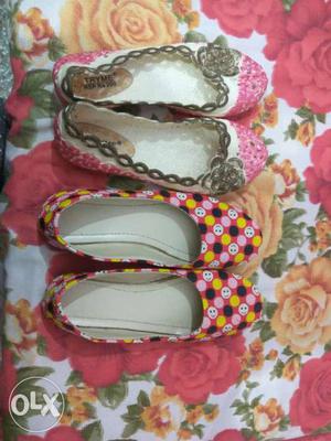 Girl's Two Pairs Of Pink, White, And Black Flats