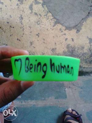 Green And Black Being Human Silicone Band
