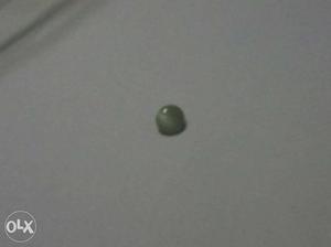 It's a chrysoberyl cat's eye stone With certificate plz call