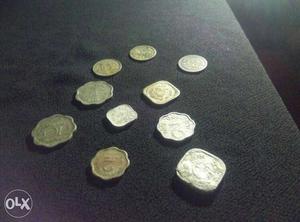 Old coins from 1 paise to 25 paise for sale.