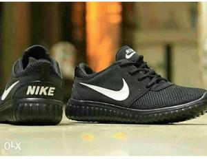 Pair Of Black Nike Athletic Shoes