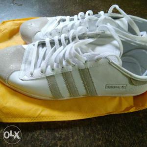 Pair Of White Adidas Low-top Sneakers
