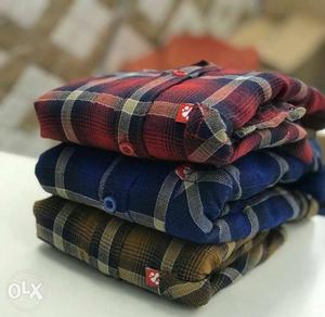 Red, Blue, And Brown Paid Tops