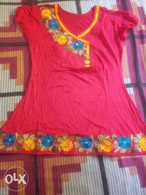Red mid-length top. Prices negotiable.