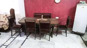 Two years old Dinning table with six chiars