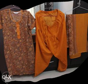 Women's Brown And Orange Floral Print Blouse; Orange Pants