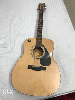 Yamaha F310 Acoustic 11 months old,new strings,