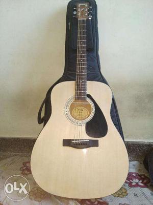 Yamaha F310 acoustic guitar. Almost new (unused), with