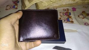 Black Pebble Leather Bi-fold Wallet