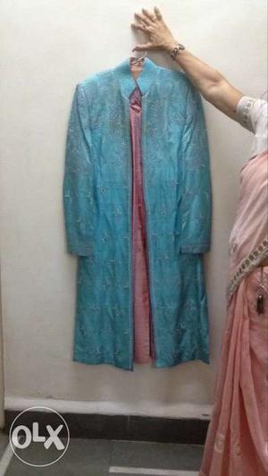 Blue n pink sherwani with elegant work