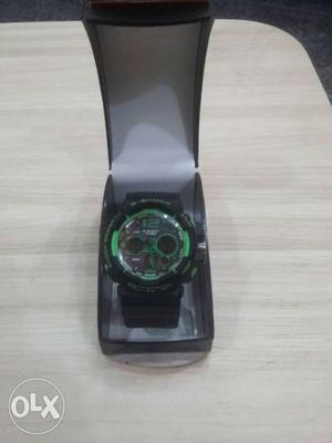 Green And Black Digital Watch With Box