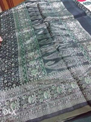 Grey And Green Paisley Textile