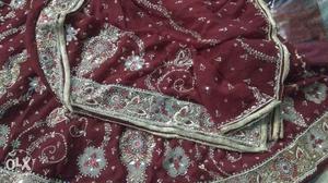 Maroon And Grey Floral Textile