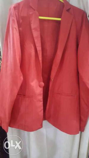 Never worn red poly-silk blazer. Got it for .