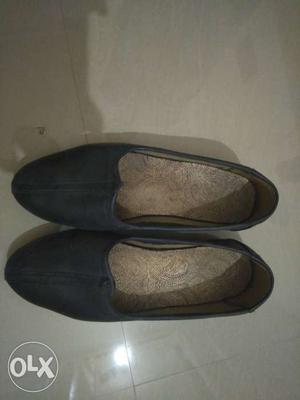 Pair Of Black-and-beige Leather Flat Shoes