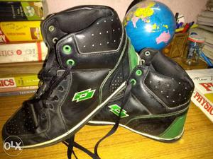 Pair Of Black-and-green Basketball Shoes