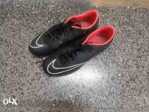 Pair Of Black-and-red Nike Cleats