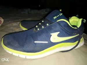Pair Of Black-and-yellow Nike Air Shoes
