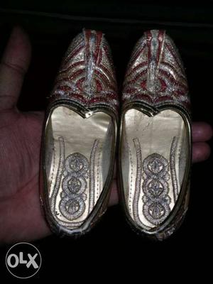 Pair Of Gold Leather Flats