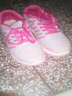 Pair Of White-and-pink Nike Running Shoes
