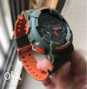 Round Gray And Orange Silicone Casio G-Shock Sports Watch