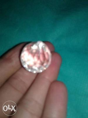 Round Silver-colored And Pink Gemstone