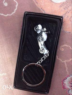 Silver-colored Motorcycle Keychain With Case