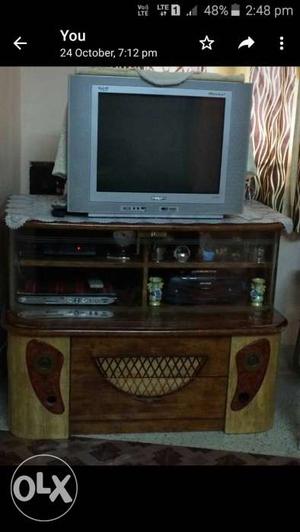 Silver crt tv with television and t.v stand combo
