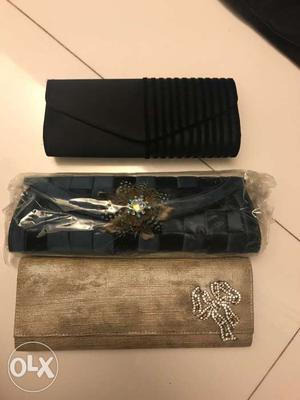 Three Gray-and-black Clutch Bags