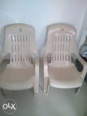 Two White Plastic relax chairs