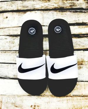 Want to sell this new pair of Nike slippers with box