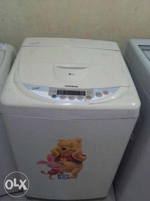 White LG Top-load Washing Machine for sell in kalewadi.