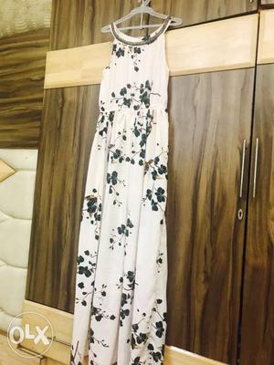A white printed maxi dress with a beautiful