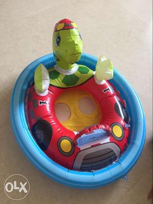 Baby's Blue, Green, And Red Turtle Inflatable Pool Ring
