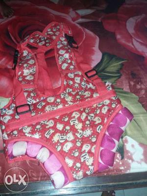 Baby's Red And White Floral Carrier